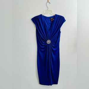 Vintage Alberto Mikali dress. Beautiful blue shade with rhinestone detail.